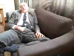 Young Daddy in suit and socks jerking off